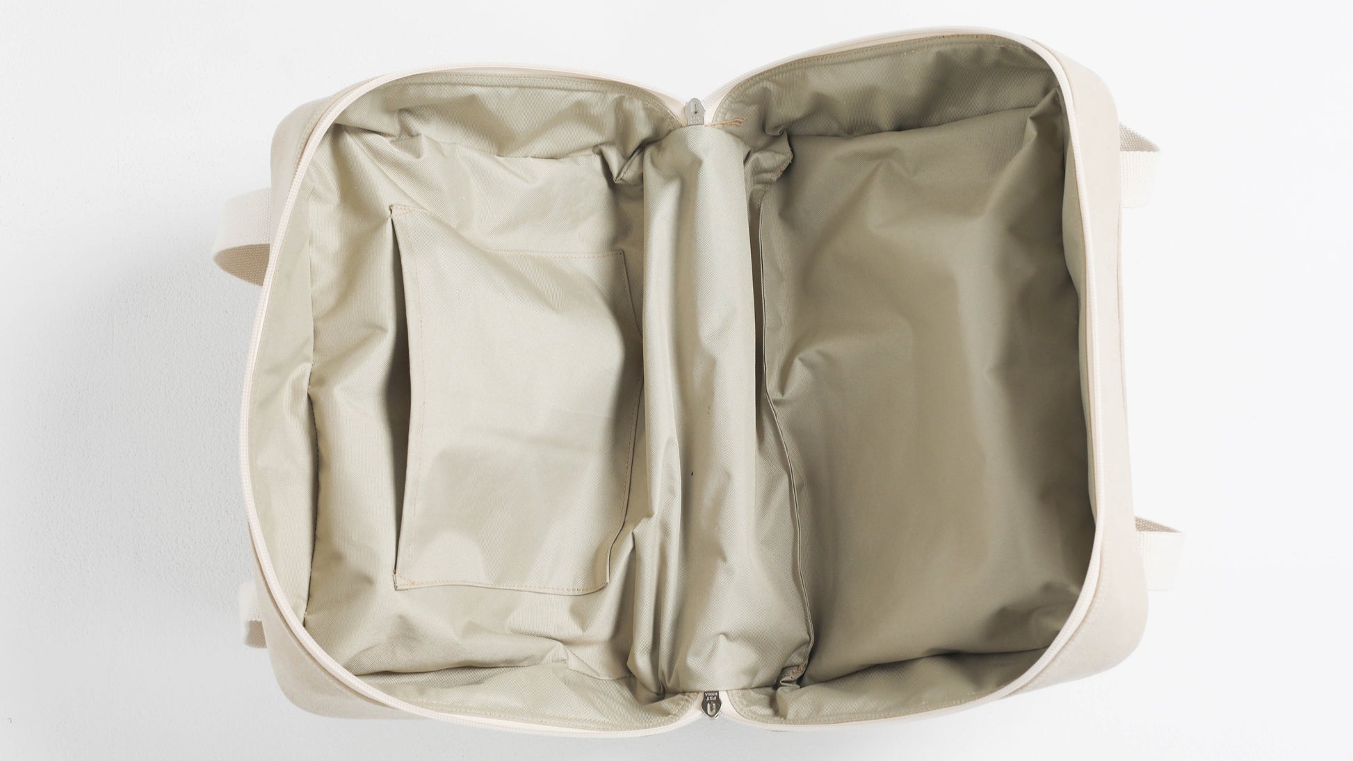Open beige backpack on a white background